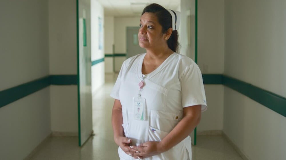 A portrait of a midwife.
