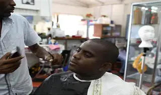 Barber Shops and Beauty Salons Promote HIV Education in Guyana